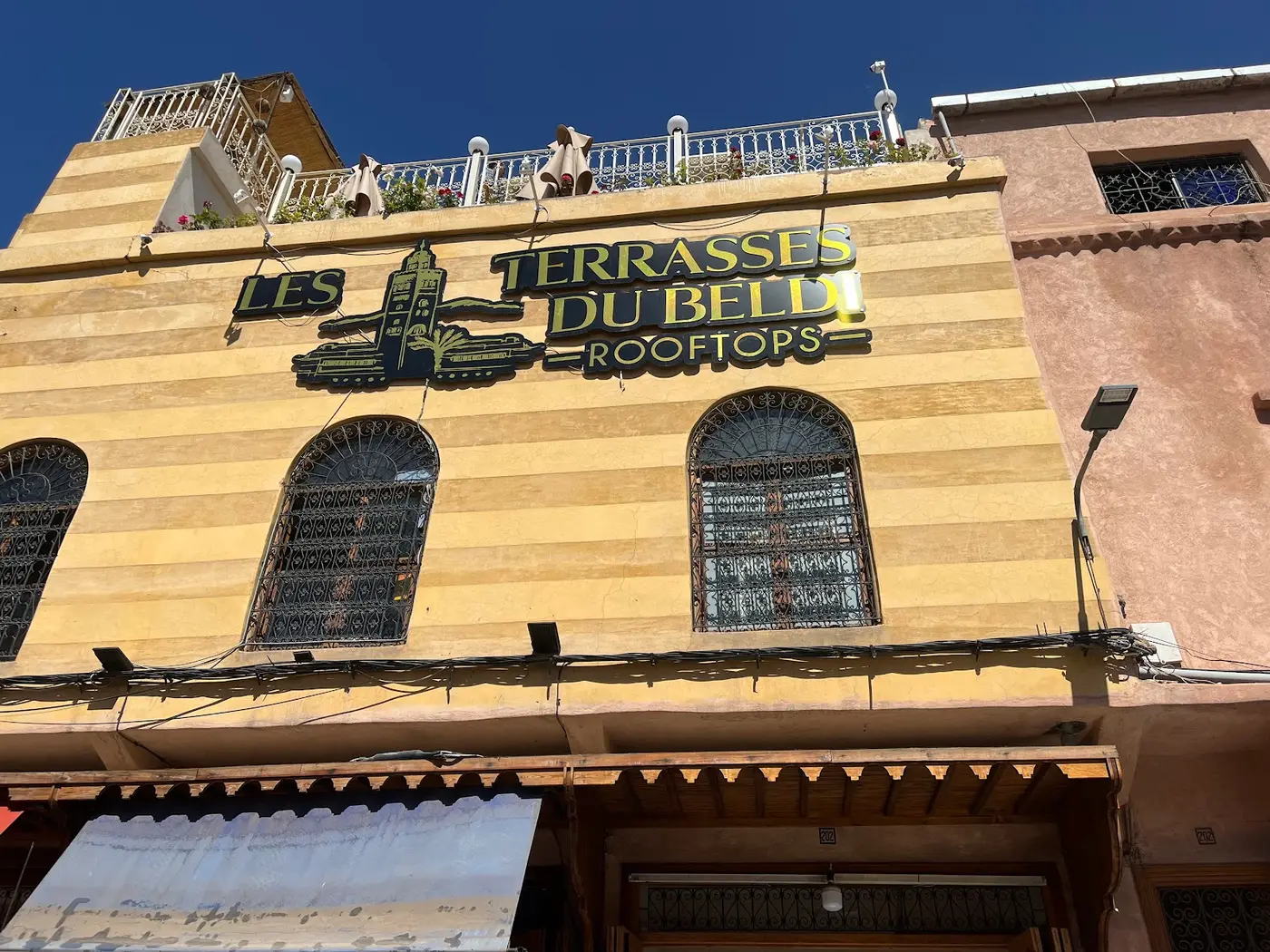 Les Terrasses Du Beldi Rooftops signage